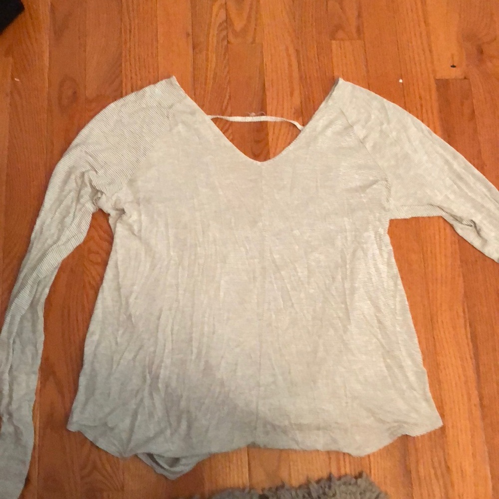 Long sleeve shirt with detailed back